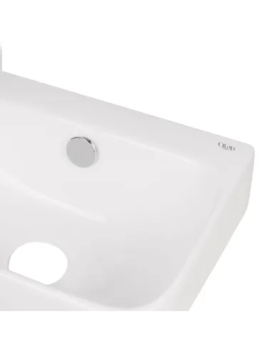 Керамічна раковина настінна Q-Тap Tern QT17115117LWN White ліва, 450х260х158 мм